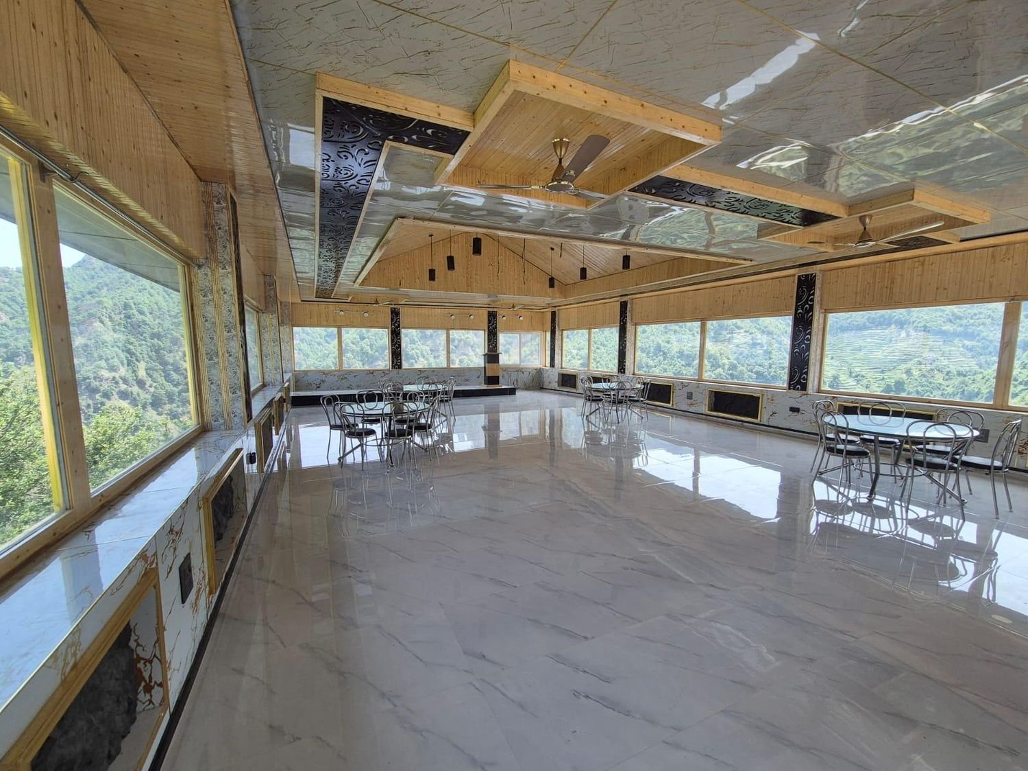 Party Hall with hill-view windows at Hotel Garden Cottage and Resort Dhanaulti